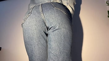 Girl desperately peeing her jeans