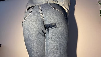 Girl desperately peeing her jeans