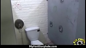 Ebony hottie milking cocks in the gloryhole 1