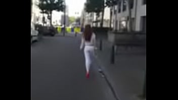 7321620 hooker walking in the street in sexy high heels and legging