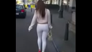 7321620 hooker walking in the street in sexy high heels and legging