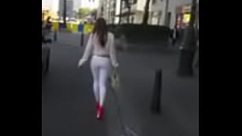 7321620 Hooker Walking In The Street In Sexy High Heels And Legging thumbnail