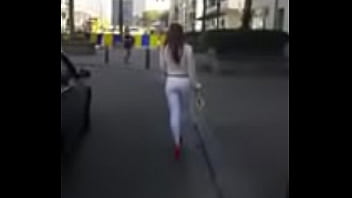 7321620 hooker walking in the street in sexy high heels and legging