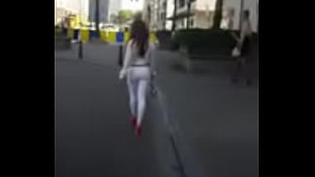 7321620 hooker walking in the street in sexy high heels and legging