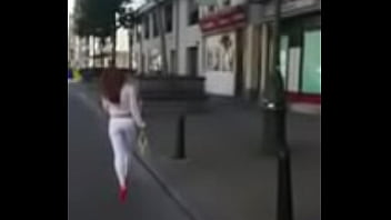7321620 hooker walking in the street in sexy high heels and legging
