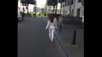 7321620 hooker walking in the street in sexy high heels and legging