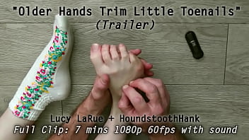 Older hands trim little toenails
