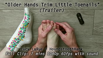Older hands trim little toenails