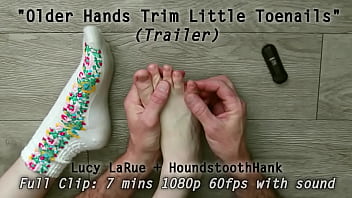 Older hands trim little toenails