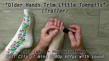 Older hands trim little toenails