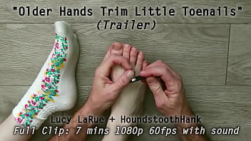 Older hands trim little toenails