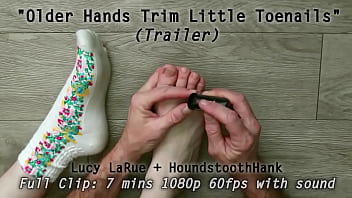 Older hands trim little toenails