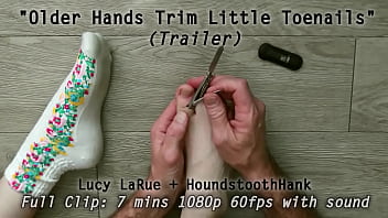 Older hands trim little toenails