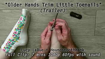 Older hands trim little toenails