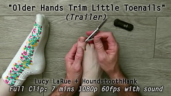 Older hands trim little toenails