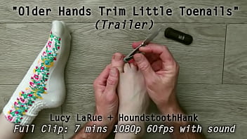 Older hands trim little toenails
