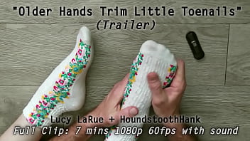 Older hands trim little toenails