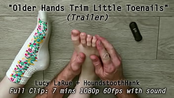 Older hands trim little toenails