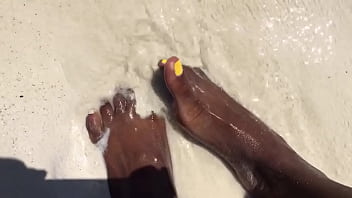 Water over her feet