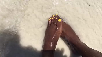 Water over her feet