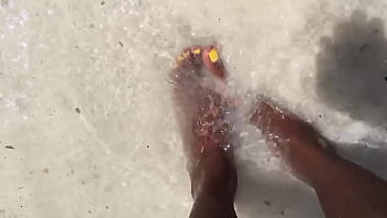 Water over her feet