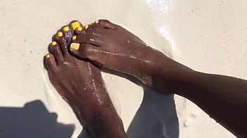 Water over her feet