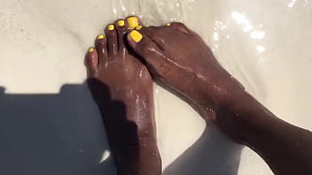 Water over her feet