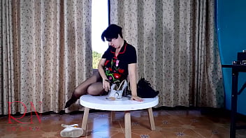 Nice lady in pantyhose and heels striptease at the round table 31