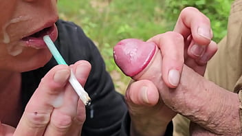 Smoking two cigarettes and give him blow job with cumshoot on my face when i smoked