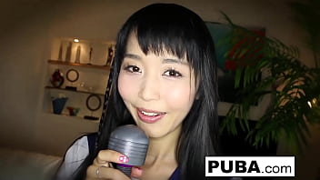 Asian hottie rubs her tight pussy