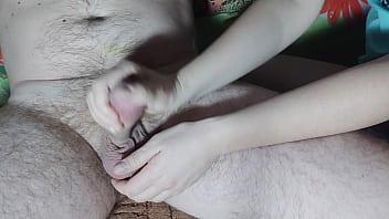 Skillful asian girl jerking off and sucking a big cock