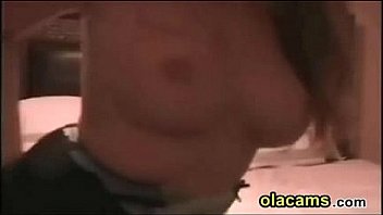 Sexy blonde milf teases big tits on webcam