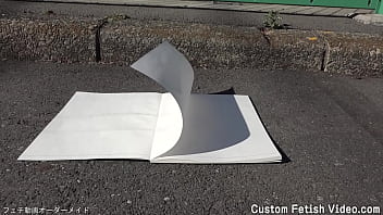 Print the traces of a girl's bicycle tire on a notebook