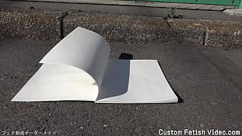 Print the traces of a girl's bicycle tire on a notebook