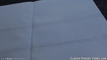 Print the traces of a girl's bicycle tire on a notebook