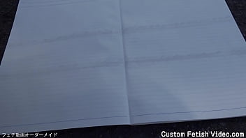 Print the traces of a girl's bicycle tire on a notebook