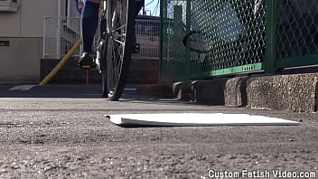 Print the traces of a girl's bicycle tire on a notebook