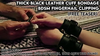 Thick black leather cuff bondage bdsm fingernail clipping