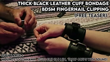 Thick black leather cuff bondage bdsm fingernail clipping