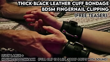 Thick black leather cuff bondage bdsm fingernail clipping