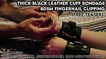 Thick black leather cuff bondage bdsm fingernail clipping