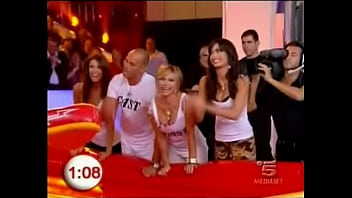Upskirt Fun On A Tv Show As Hot Babes In Miniskirts Are Encouraged To Surf thumbnail