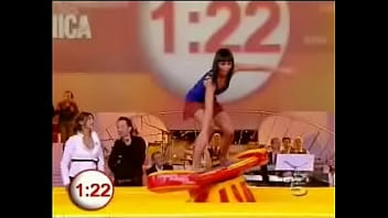 Upskirt fun on a tv show as hot babes in miniskirts are encouraged to surf