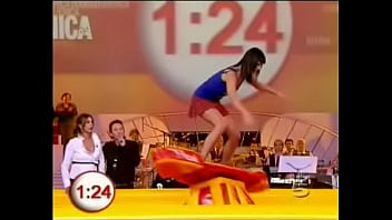 Upskirt fun on a tv show as hot babes in miniskirts are encouraged to surf