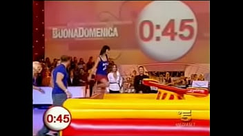 Upskirt fun on a tv show as hot babes in miniskirts are encouraged to surf