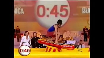 Upskirt fun on a tv show as hot babes in miniskirts are encouraged to surf