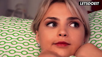 Cute young backpacker surprising hotel guest letsdoeit