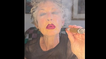 I sensuously smoke a cigar and then we have a nice sex session