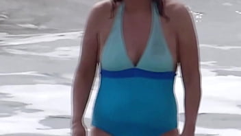 On the beach my wife shows off looking for a man to fuck her strips naked and urinates