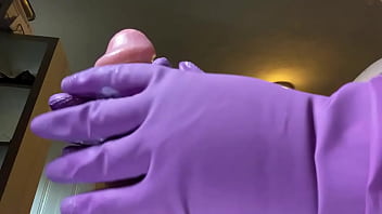 Stroking that hard cock in gloves